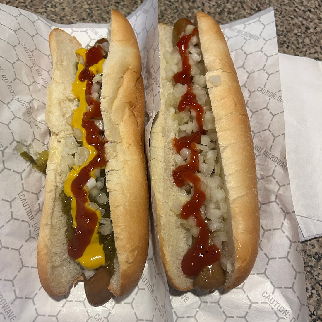 Casino Hot Dog Stand signature dishes  Classic Hot Dog, Chili Cheese Dog.